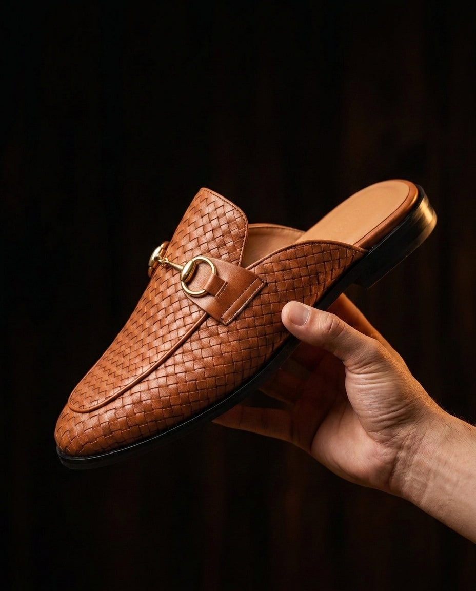 Woven Horsebit Mule held in hand