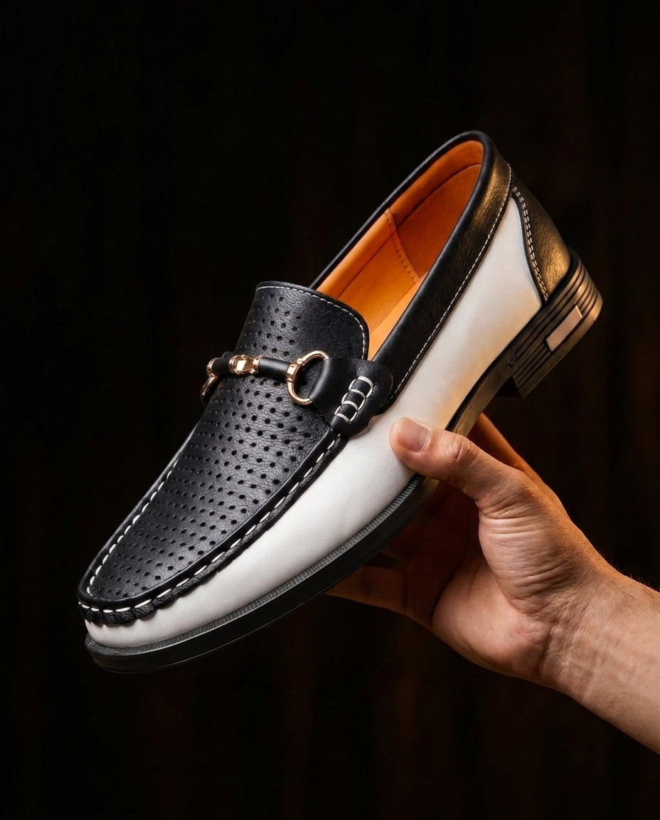 Continental Loafer held in hand