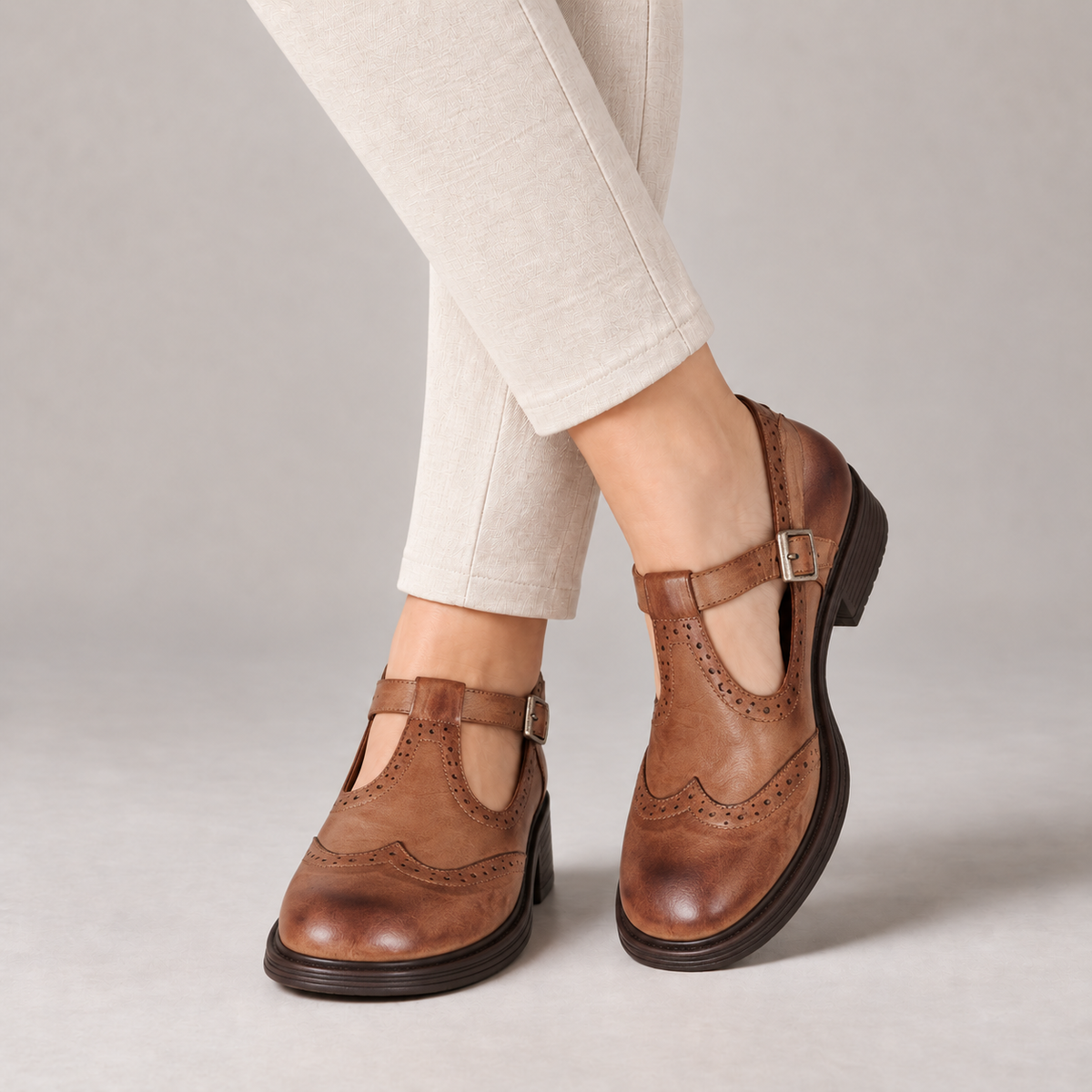 Augusta Wingtip T-Bar Mary Janes — Brown | Hudson & Wells